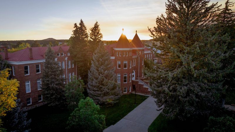 Drone image of Old Main on the N A U Flagstaff Mountain Campus