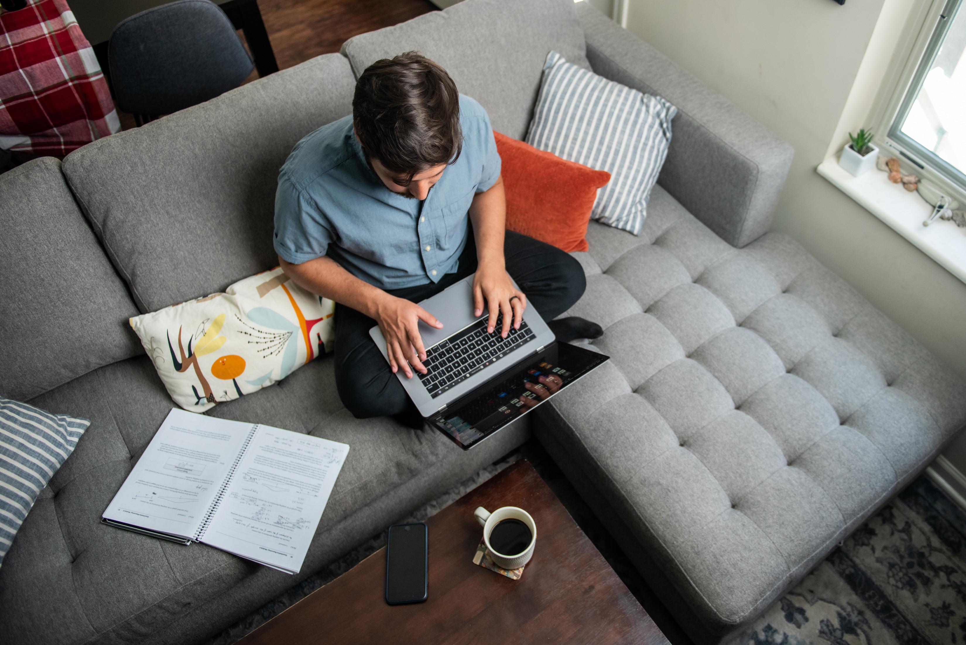 Student working on a computer from home.