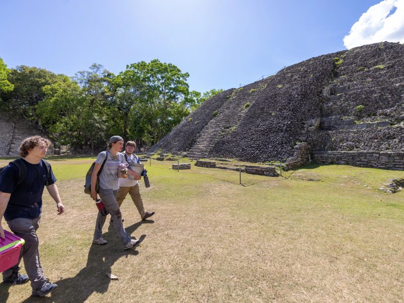 Three N A U archaeology students on their way to examine Maya ruins in Belize.