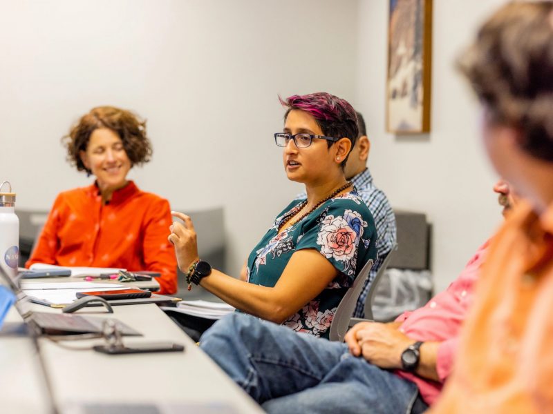 N A U faculty work together during a senate meeting.