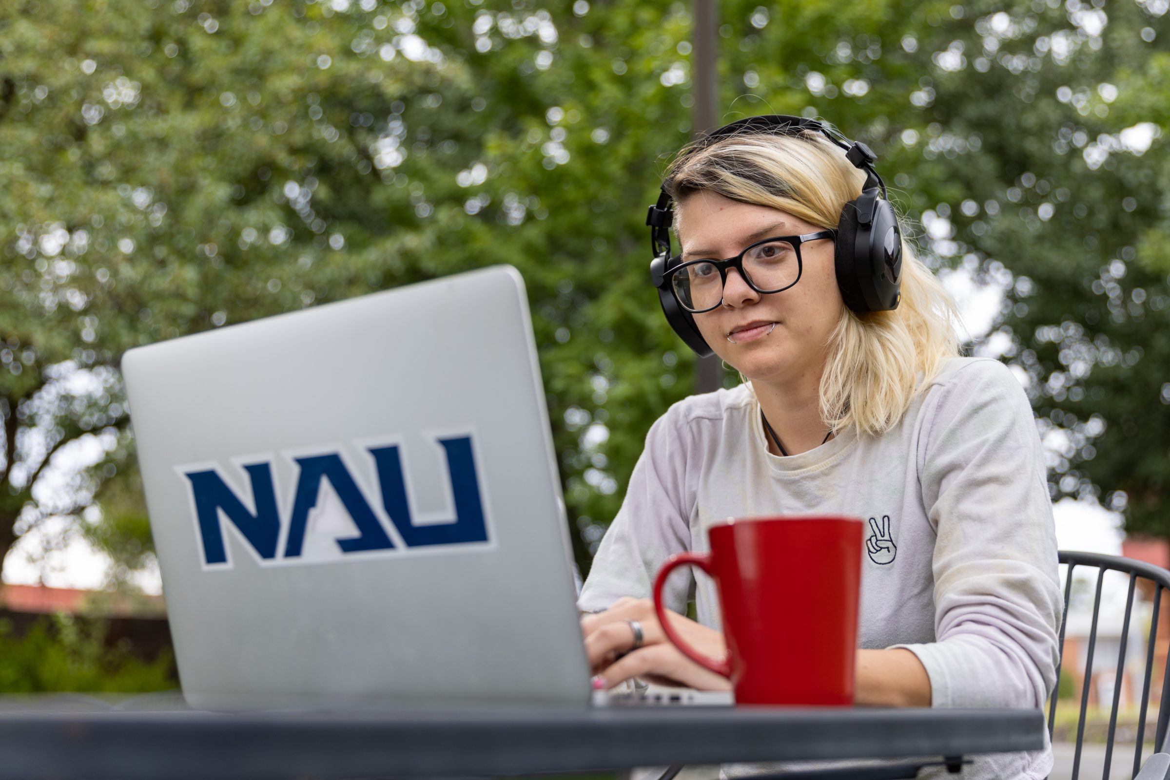 N A U Online adult learner attends class virtually.