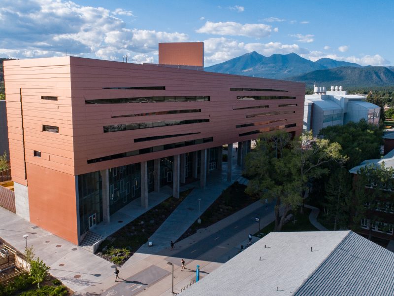 Drone shot of N A U campus building.