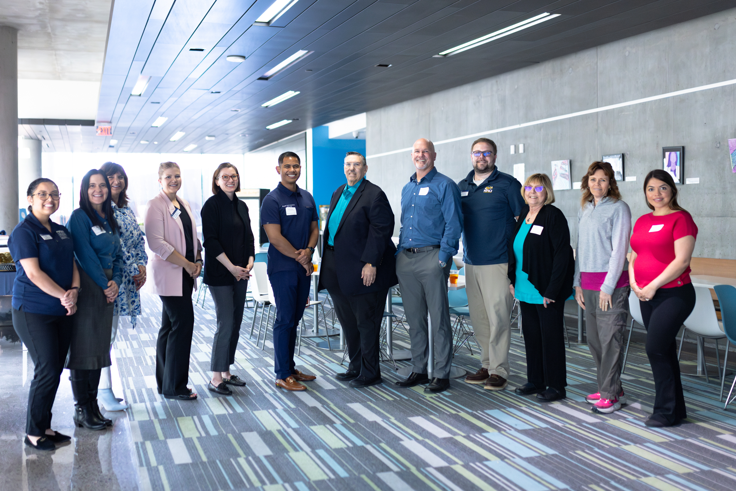 A group photo of speakers and participants at ABRC event.