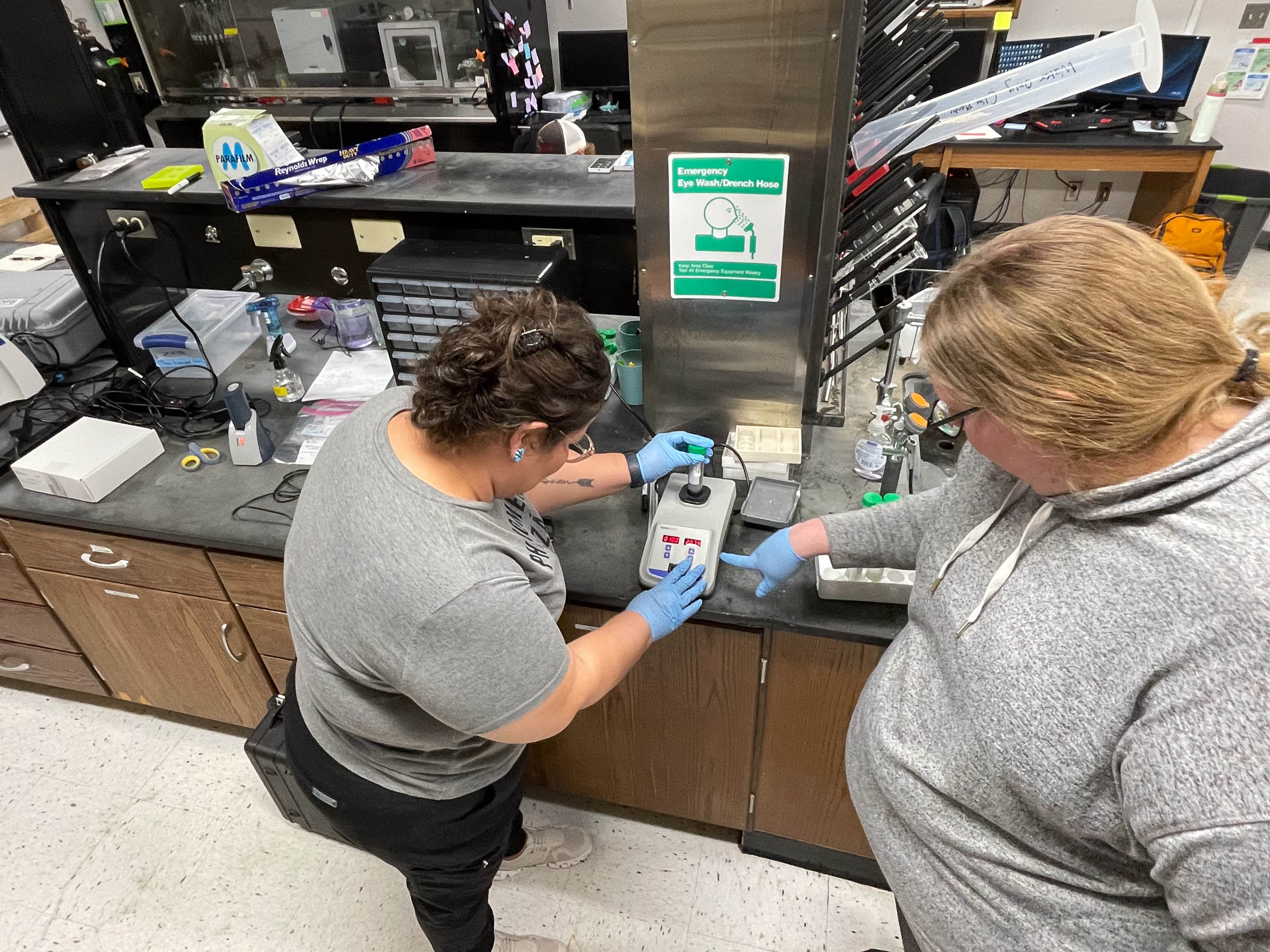 Goodluck operates a portable x-ray fluorescence device at the University of Mississippi.