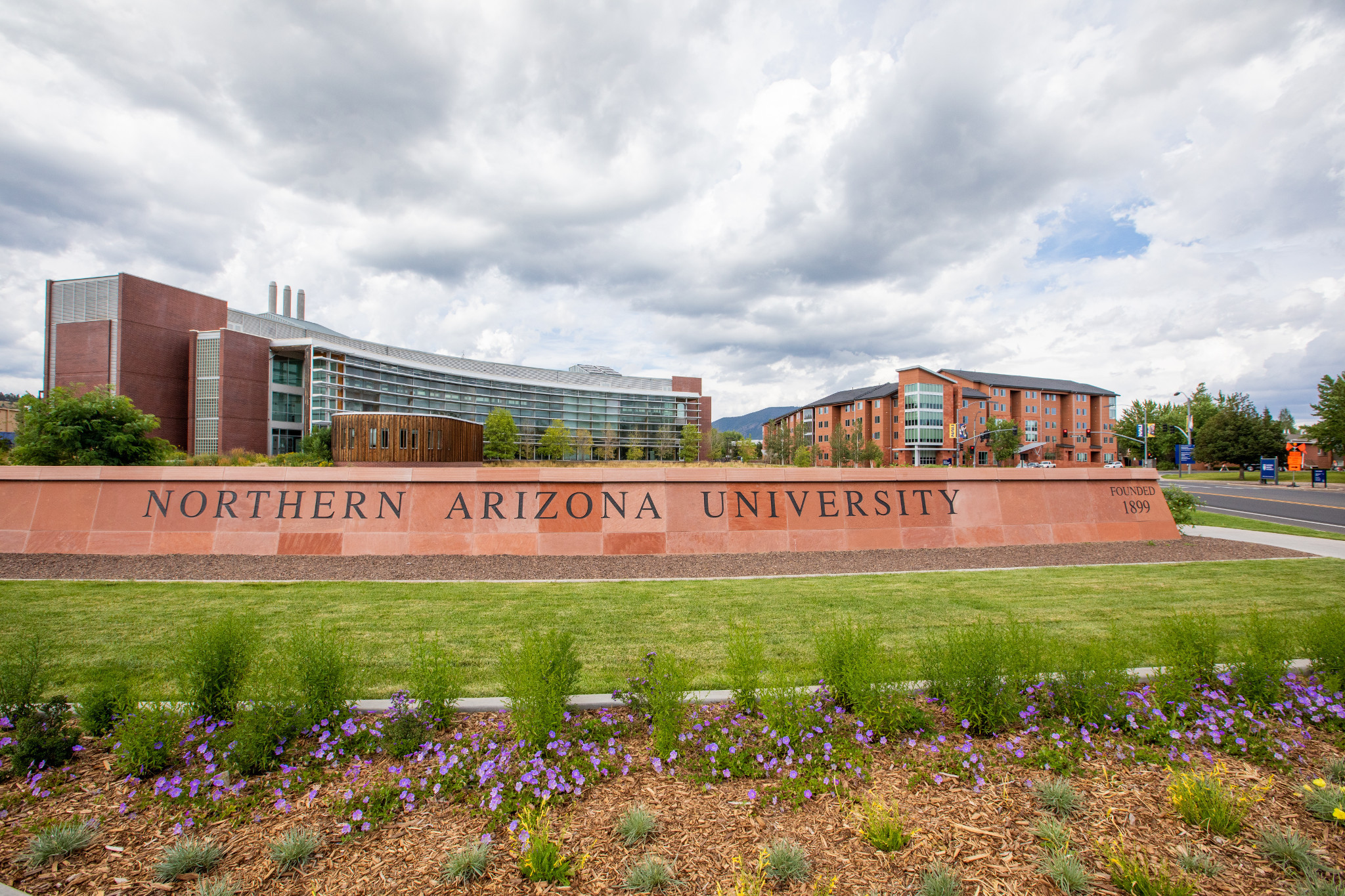 Applied Research and Development building behind the Northern Arizona University entrance sign.