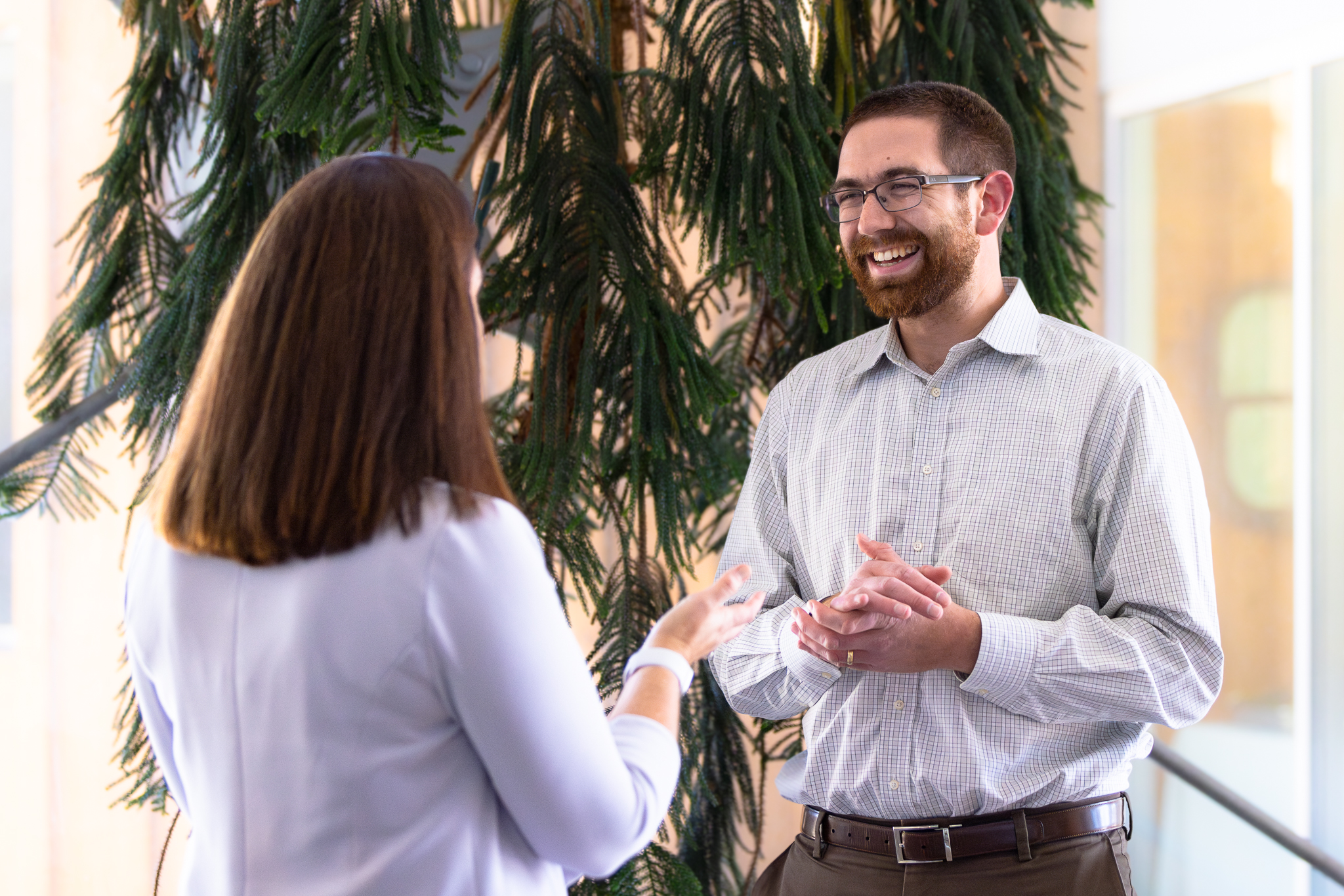 Eric Cerino talking to female staff member.