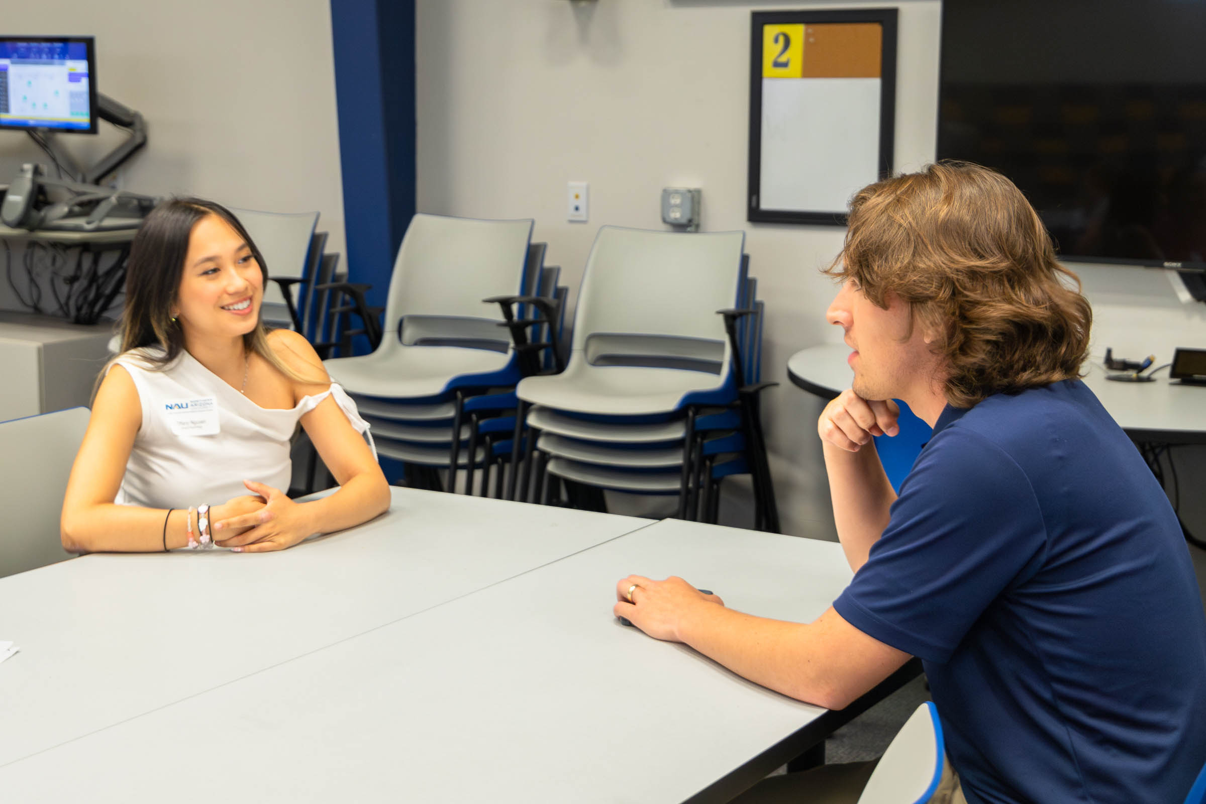 Tiffany Nguyen and Niccolo Iannello discuss research interests during the networking portion of C-CART orientation.