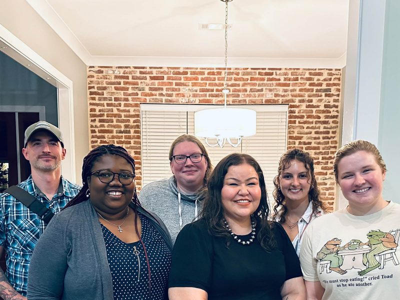 Goodluck and Anastario with Roper and PhD students from her laboratory: Tonia Voke Aminone, Maggie Craze, and Shayla Victoria.