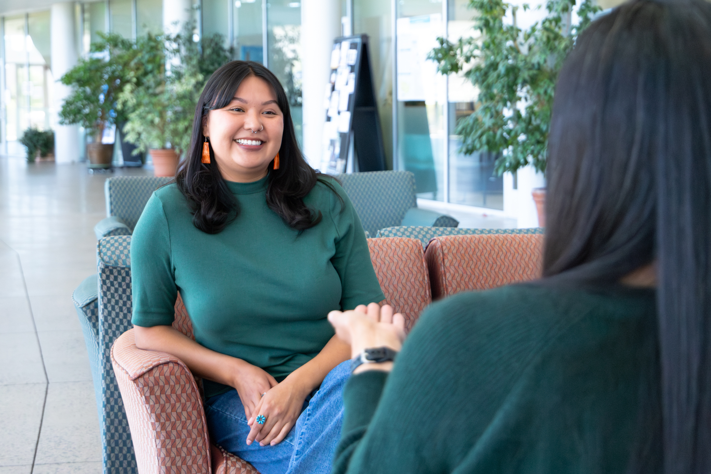 Chassity Begay engaging with a researcher