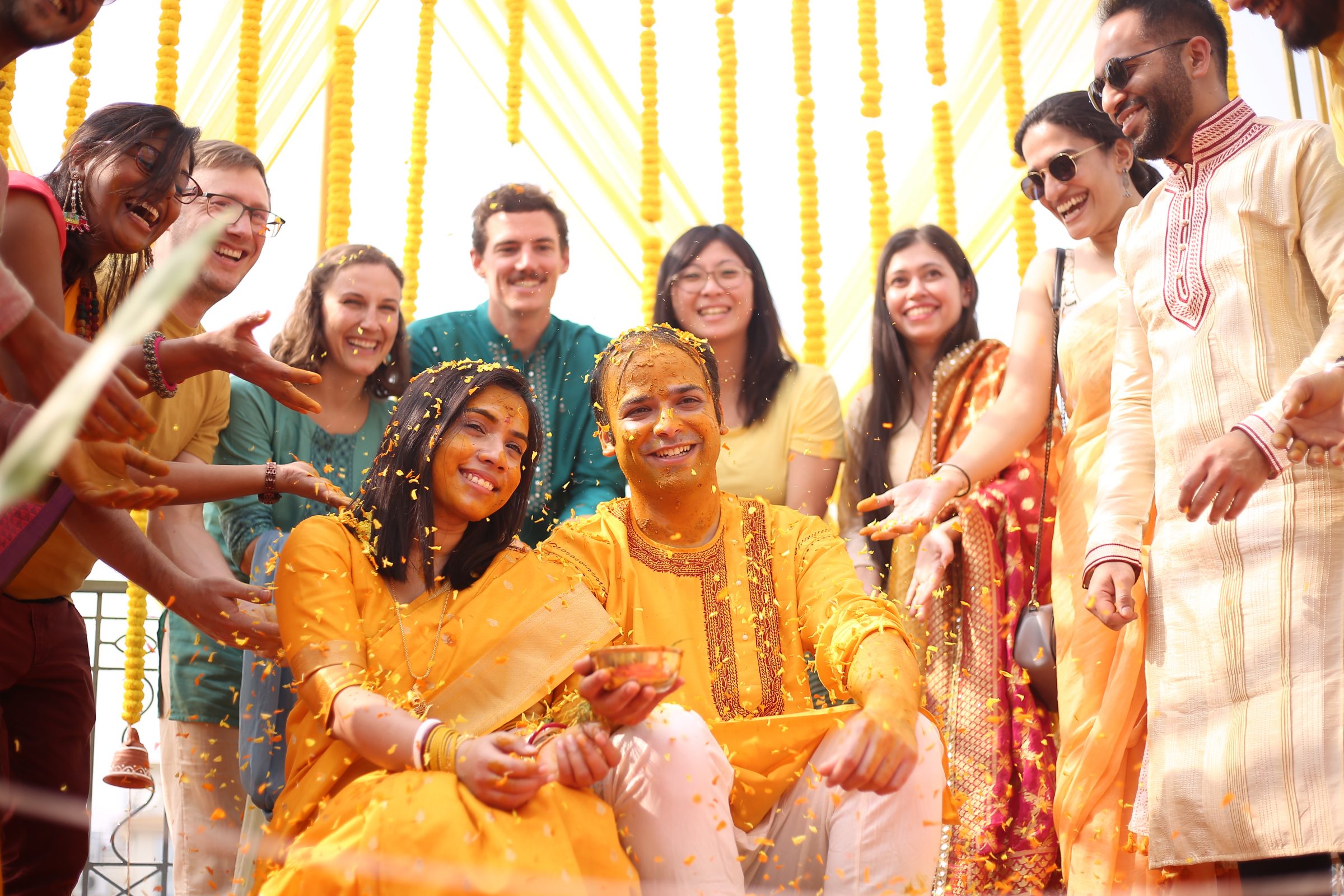 Indrakshi Roy with a group of people at his wedding. 