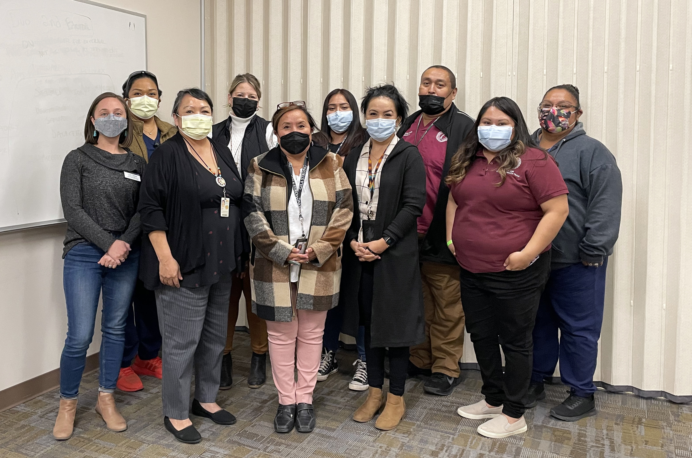 Louisa OMeara and Community Health Representatives pose for a group photo.