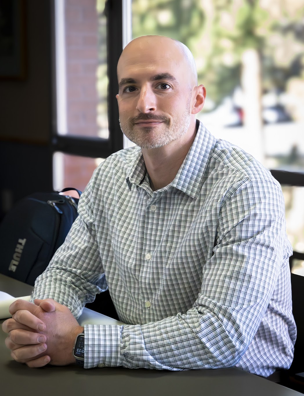 A photograph of Dr. Mike Anastario attending Dr. Spengler's talk on Climate Change on November 9.