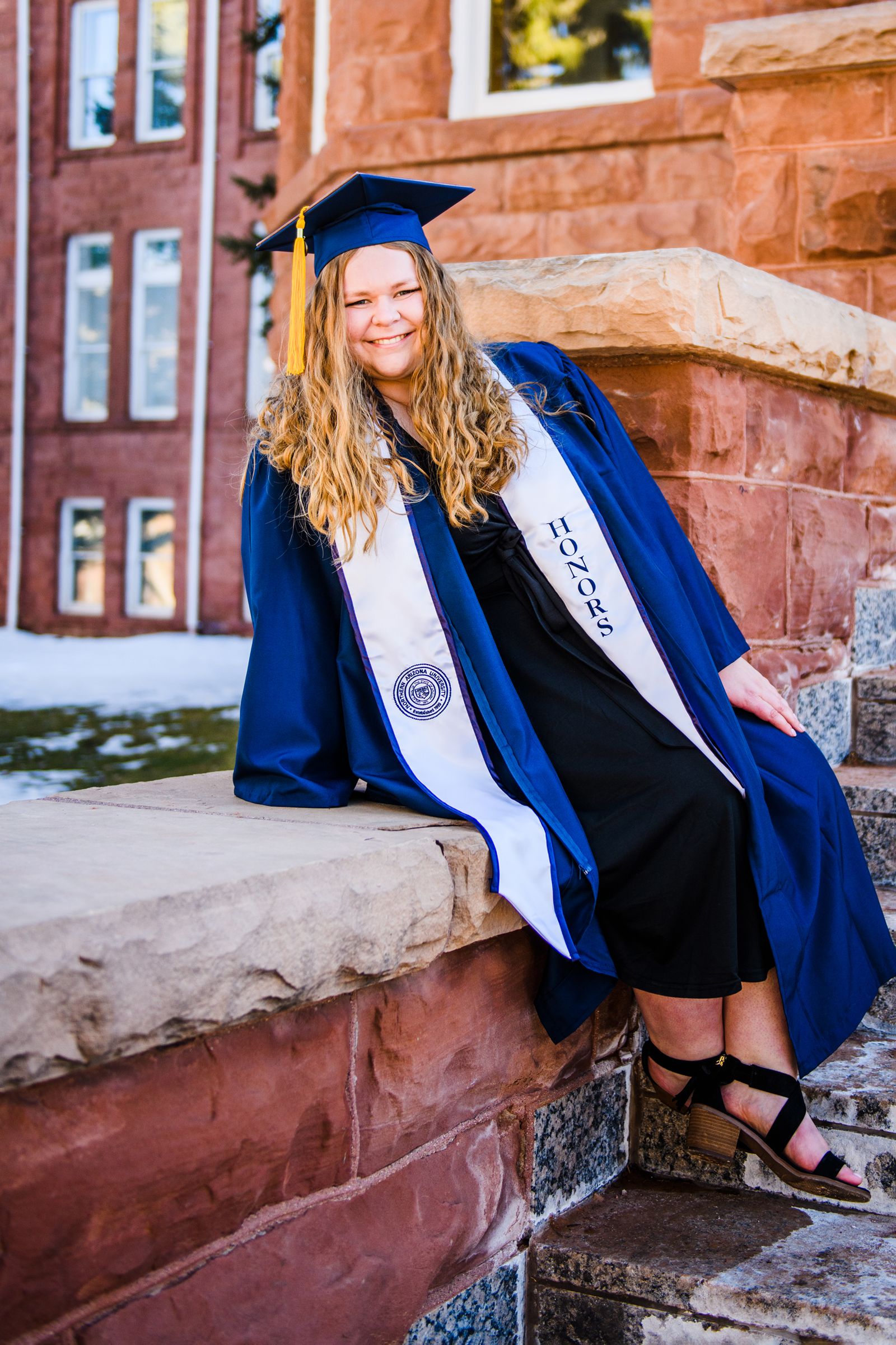 Bethany Robinson in graduation cap and gown.