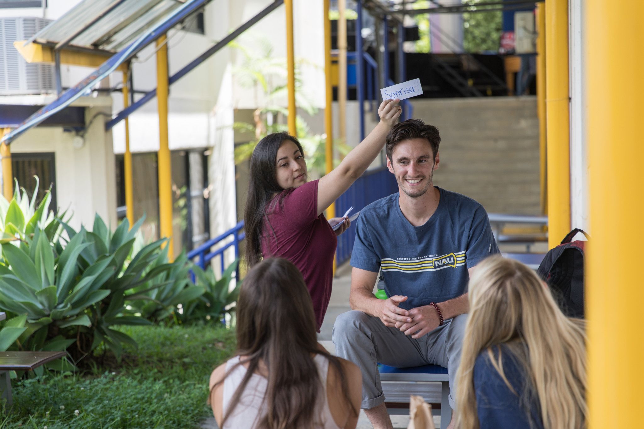 Study abroad students playing a language learning game.