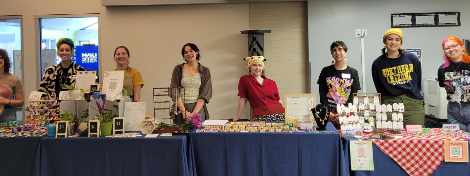 Boundaryless student marketplace program members show off their products at a pop-up sale.