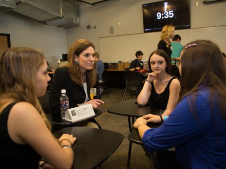 woman engaging with community members