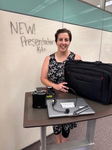 Pamela Buzzard displays a data presentation kit.