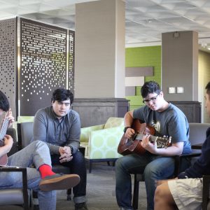 Picture of student playing instruments in Reilly lobby