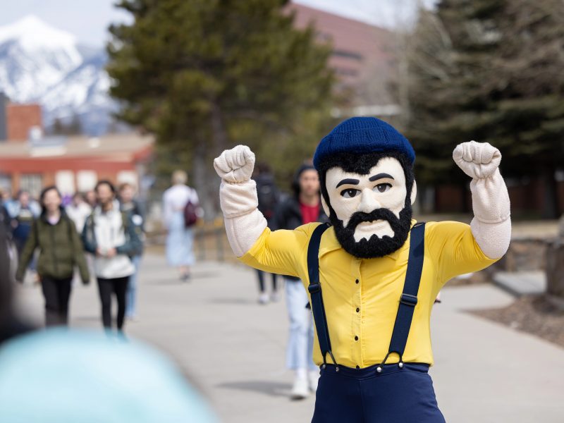 Louie the Lumberjack poses on the N A U Flagstaff Mountain Campus.