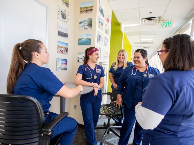 Nursing students chatting in between lessons.