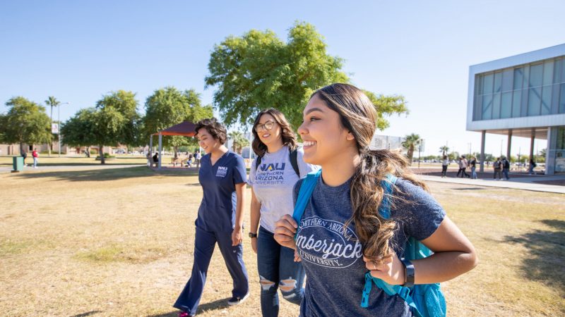 Undergraduate students in N A U's nursing program walk the the N A U Yuma campus.