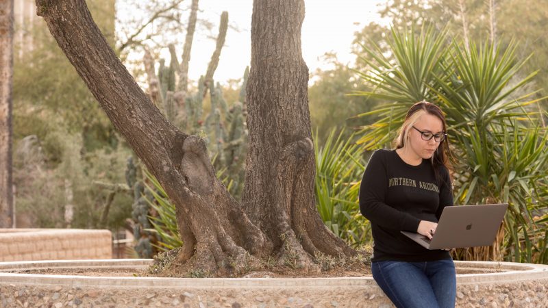 A N A U nursing student studies outside in Tucson, Arizona.