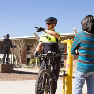 A NAU Police Officer gives directions.