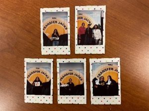 Polaroid pictures of students with art