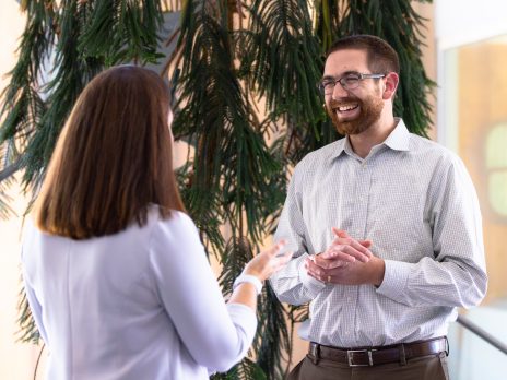 Eric Cerino, TAG Specialist, speaks with Monica Lininger at TAG-SC headquarters.