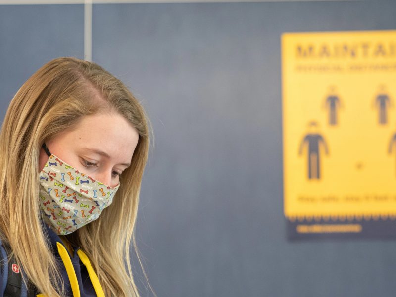 Student wears a mask on campus