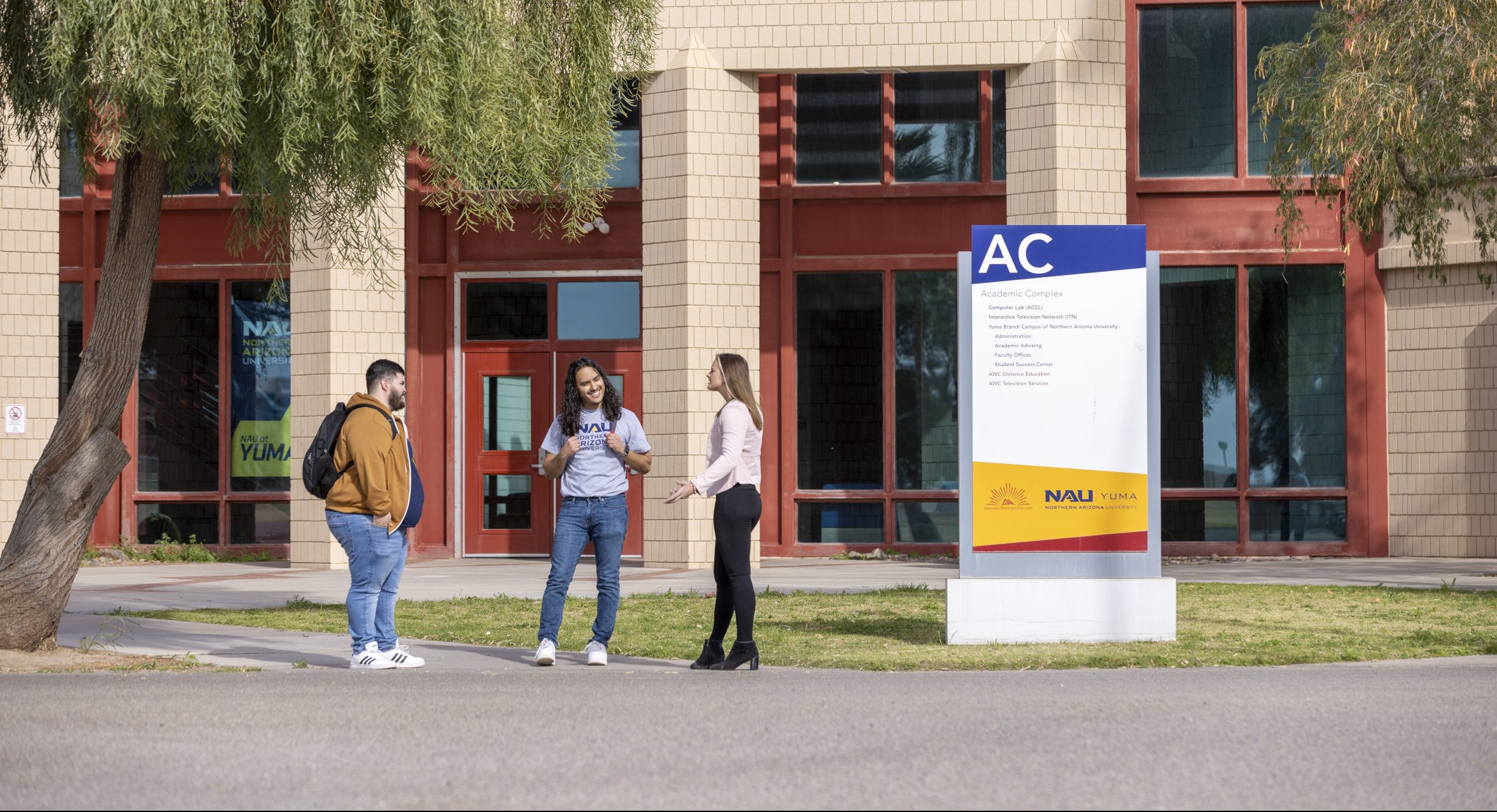 Students talking outside on NAU–Yuma campus