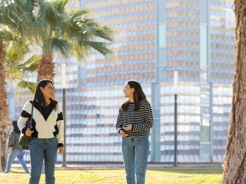 NAU–Yuma students talking outside on campus