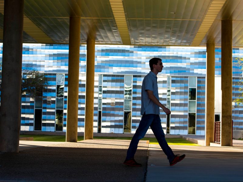Person walking on NAU–Yuma campus