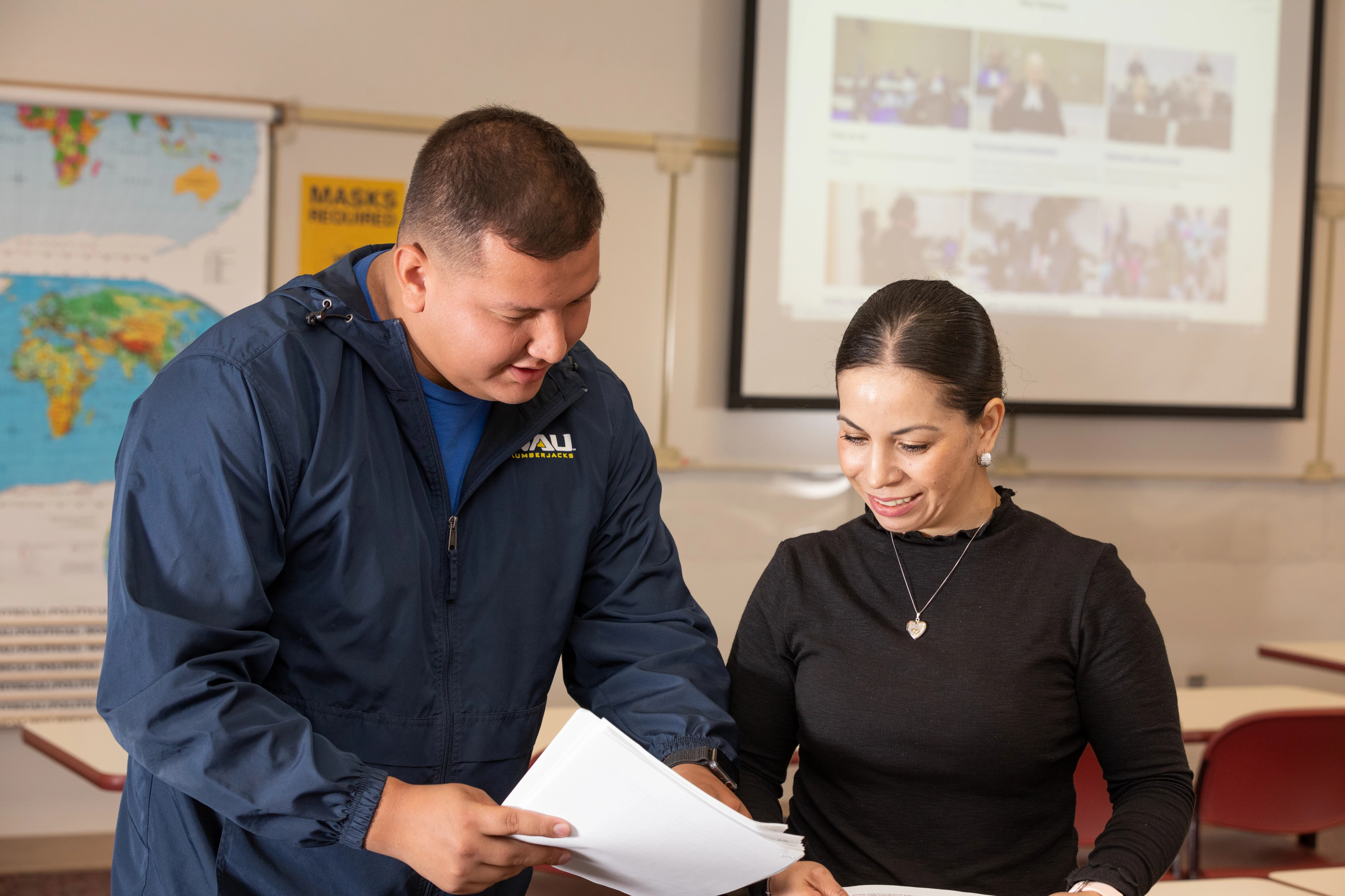 NAU–Yuma students consulting each other in class