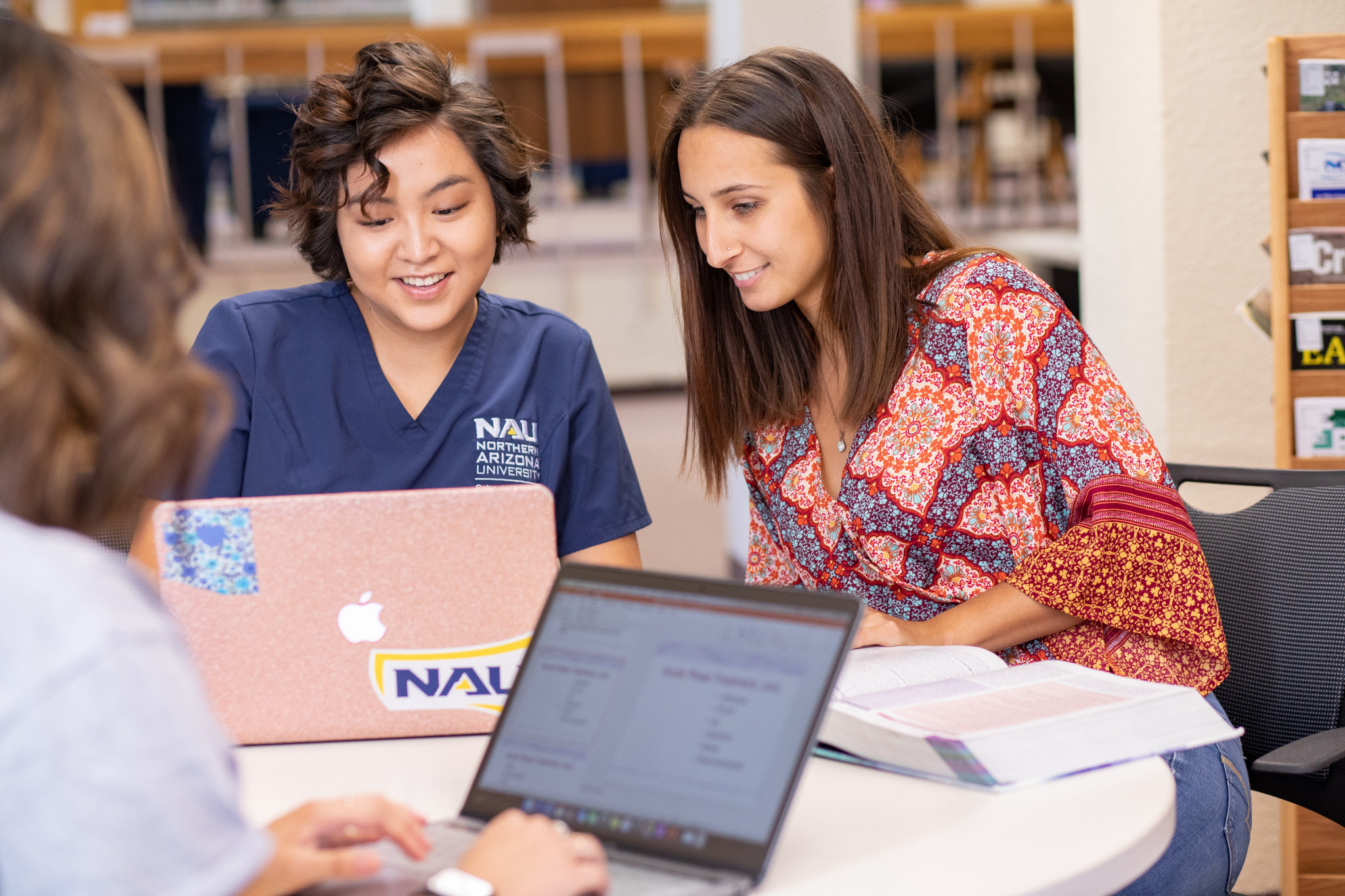 NAU students working together at the library